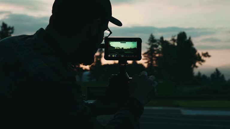 the photographer men filming stock video
